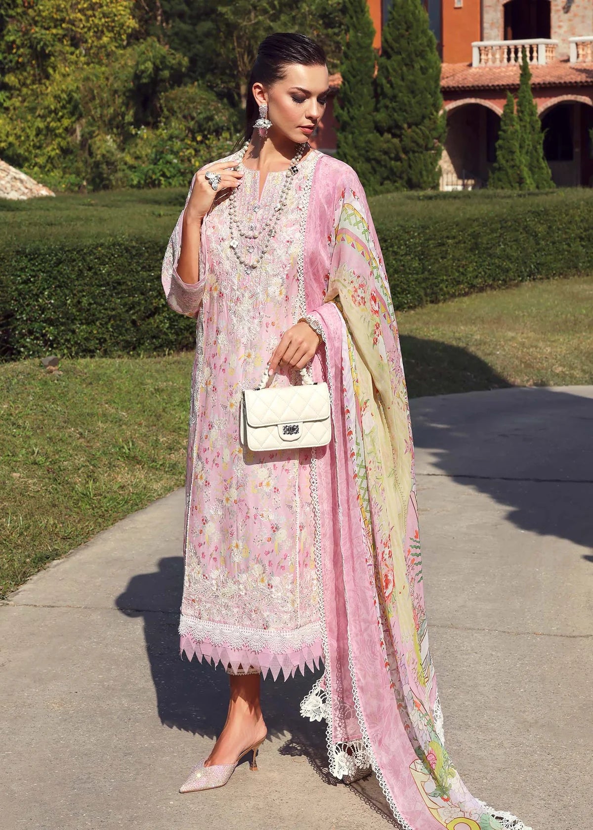 Model wearing pastel pink Lyle dress from Kanwal Malik Zaina Lawn '25, ideal for Pakistani luxury pret and Pakistani clothes online in UK.