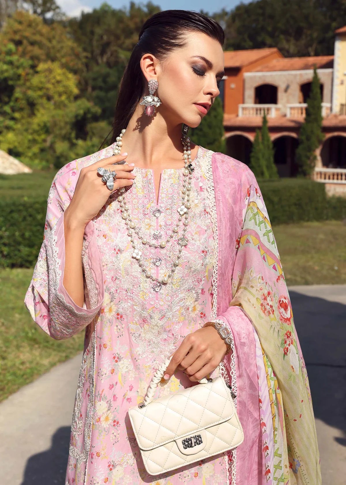 Model wearing pastel pink Lyle dress from Kanwal Malik Zaina Lawn '25, ideal for Pakistani luxury pret and Pakistani clothes online in UK.
