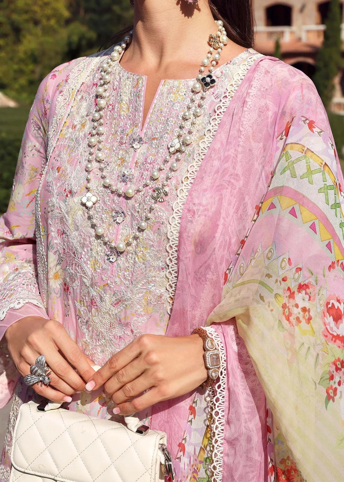 Model wearing pastel pink Lyle dress from Kanwal Malik Zaina Lawn '25, ideal for Pakistani luxury pret and Pakistani clothes online in UK.