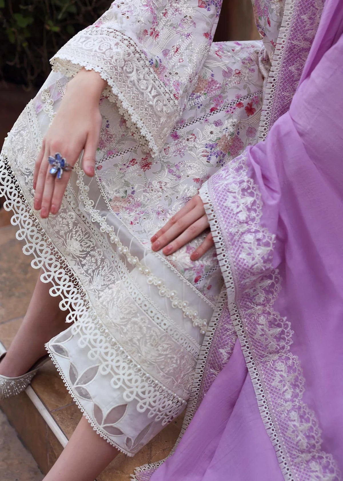 Model wearing pastel pink and white floral Raya dress from Kanwal Malik Zaina Lawn '25, Pakistani luxury pret for online shoppers in UK.
