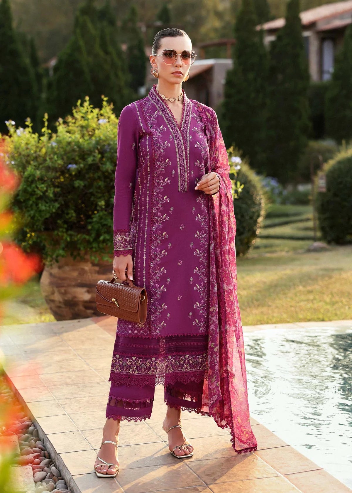 Model wearing deep magenta Alvina dress from Kanwal Malik Zaina Lawn '25, perfect Pakistani luxury pret for women shopping online in UK.