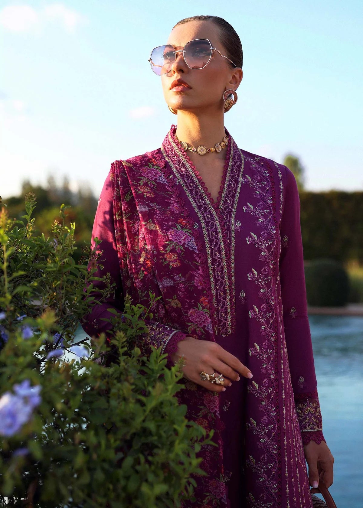 Model wearing deep magenta Alvina dress from Kanwal Malik Zaina Lawn '25, perfect Pakistani luxury pret for women shopping online in UK.
