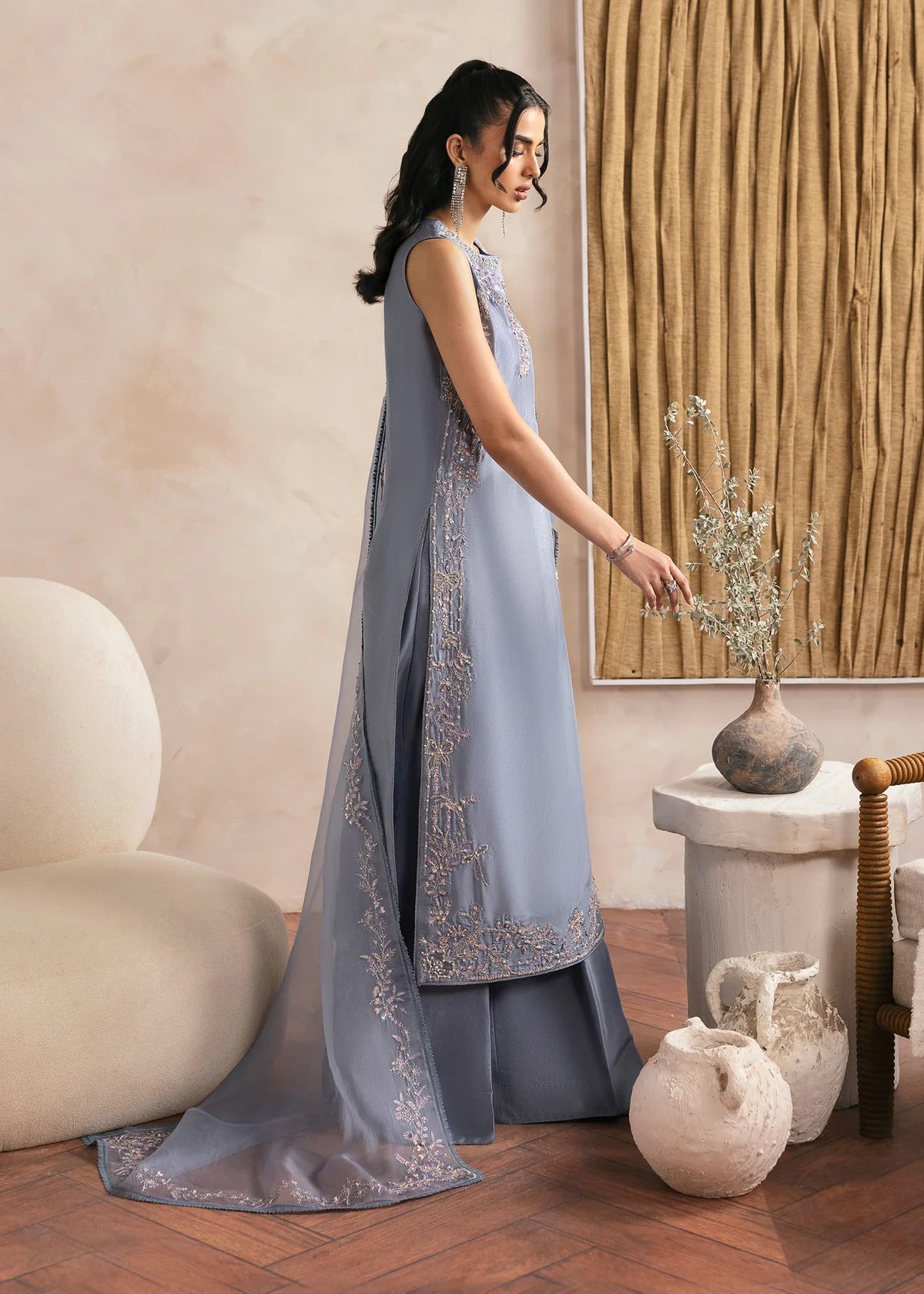 Model wearing Kanwal Malik Natalia grey luxury pret dress. Shop Pakistani clothes online in the UK for festive and casual wear.