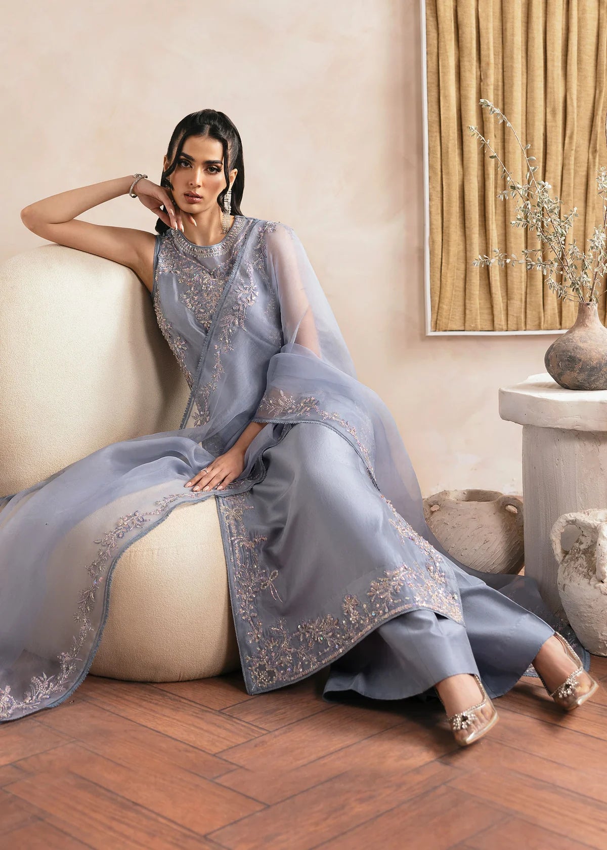 Model wearing Kanwal Malik Natalia grey luxury pret dress. Shop Pakistani clothes online in the UK for festive and casual wear.