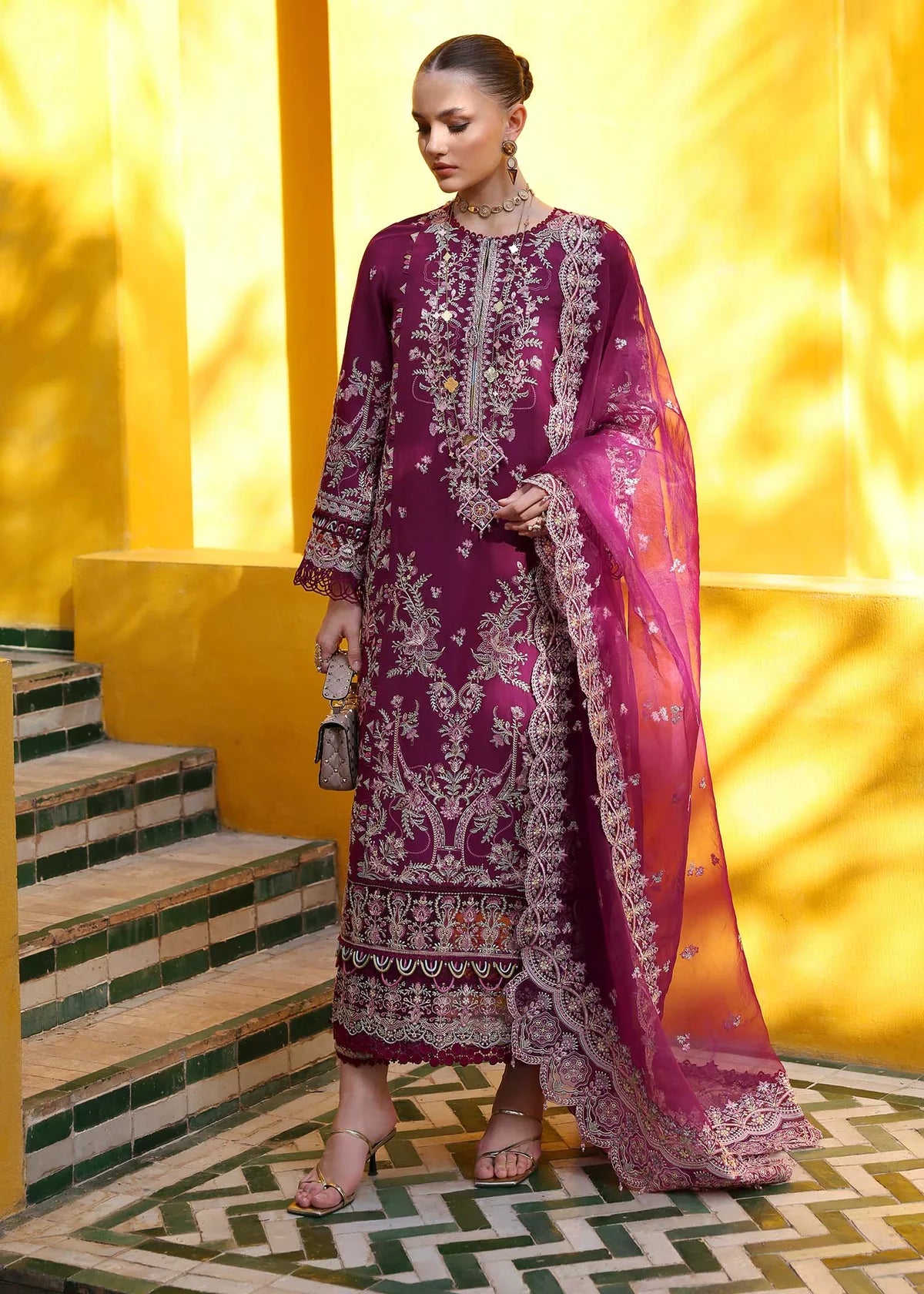 Model wearing deep magenta Lavena outfit from Kanwal Malik Elysia Luxury Lawn '25, ideal for Pakistani luxury pret and clothes online in UK.