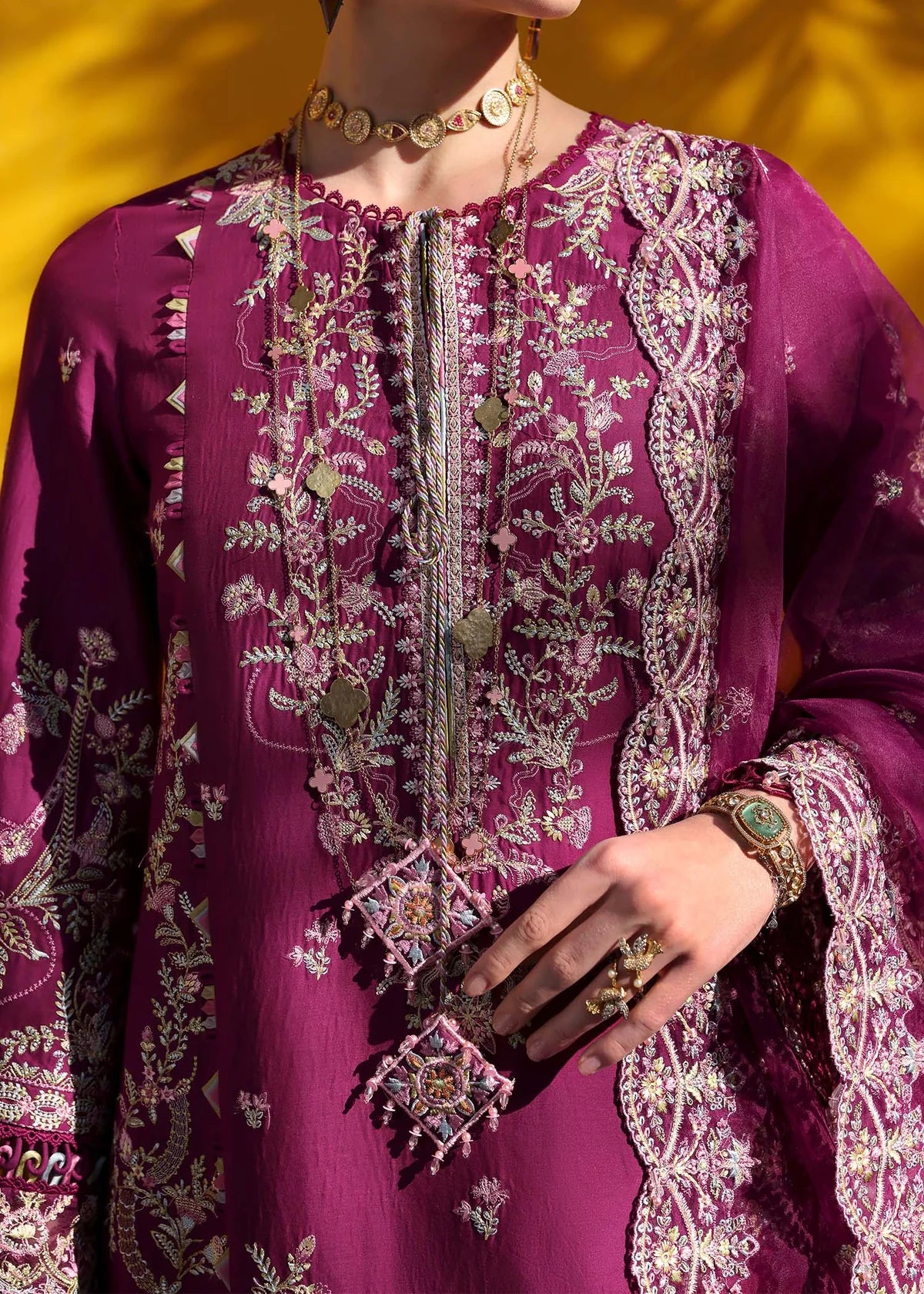 Model wearing deep magenta Lavena outfit from Kanwal Malik Elysia Luxury Lawn '25, ideal for Pakistani luxury pret and clothes online in UK.
