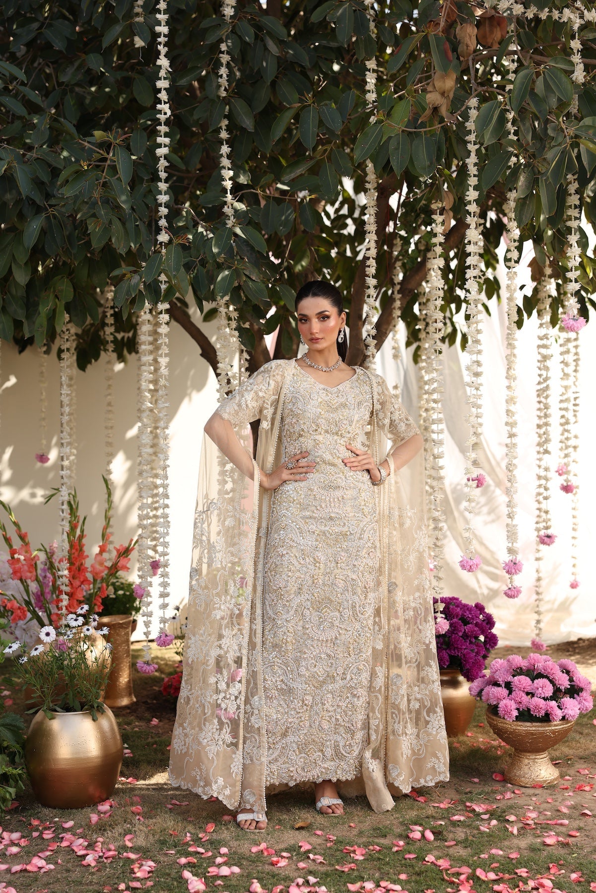 Model wearing beige embellished straight-cut shirt with trousers from Mysie By Tahira’s Tessa, featuring intricate detailing, Pakistani luxury pret clothes online in UK.