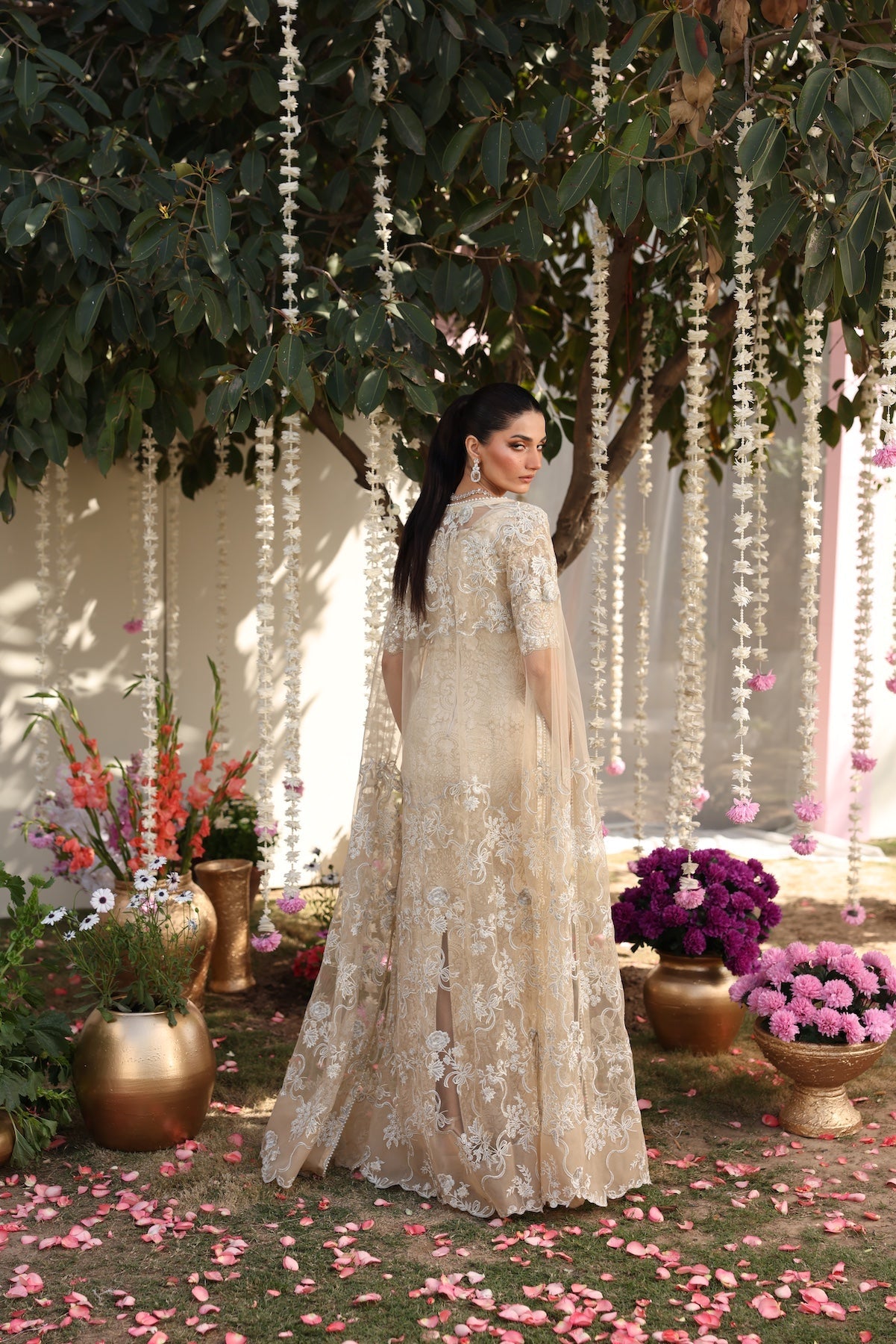 Model wearing beige embellished straight-cut shirt with trousers from Mysie By Tahira’s Tessa, featuring intricate detailing, Pakistani luxury pret clothes online in UK.
