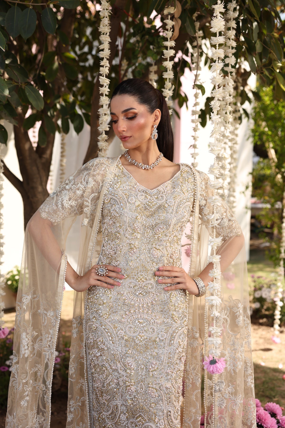 Model wearing beige embellished straight-cut shirt with trousers from Mysie By Tahira’s Tessa, featuring intricate detailing, Pakistani luxury pret clothes online in UK.
