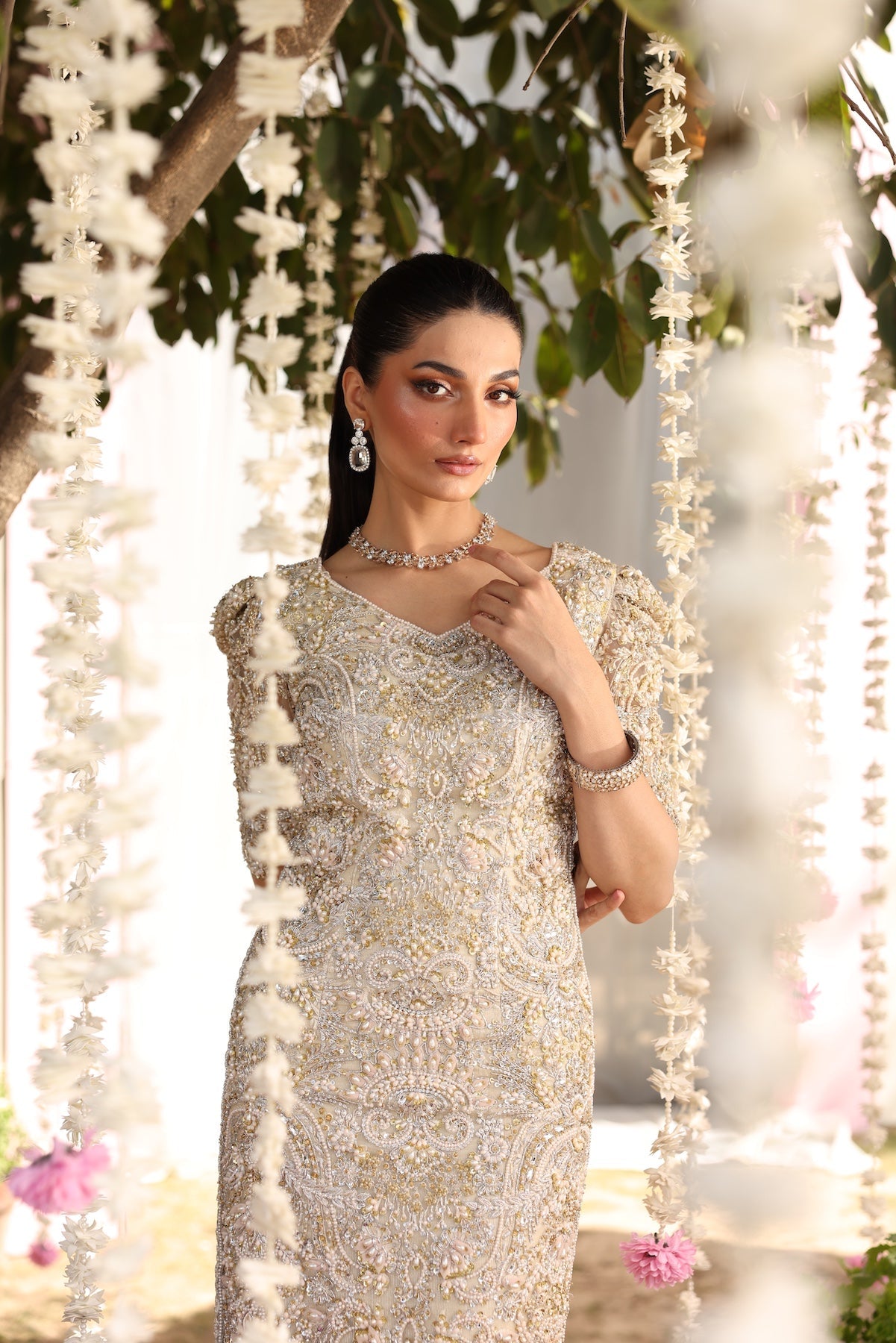 Model wearing beige embellished straight-cut shirt with trousers from Mysie By Tahira’s Tessa, featuring intricate detailing, Pakistani luxury pret clothes online in UK.
