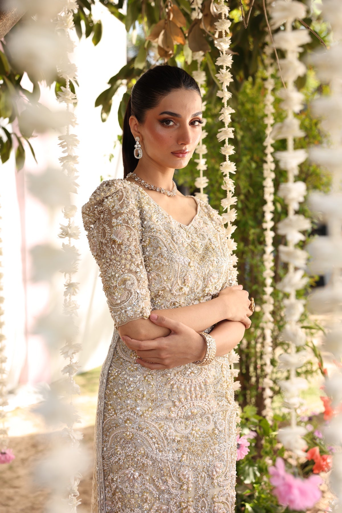 Model wearing beige embellished straight-cut shirt with trousers from Mysie By Tahira’s Tessa, featuring intricate detailing, Pakistani luxury pret clothes online in UK.