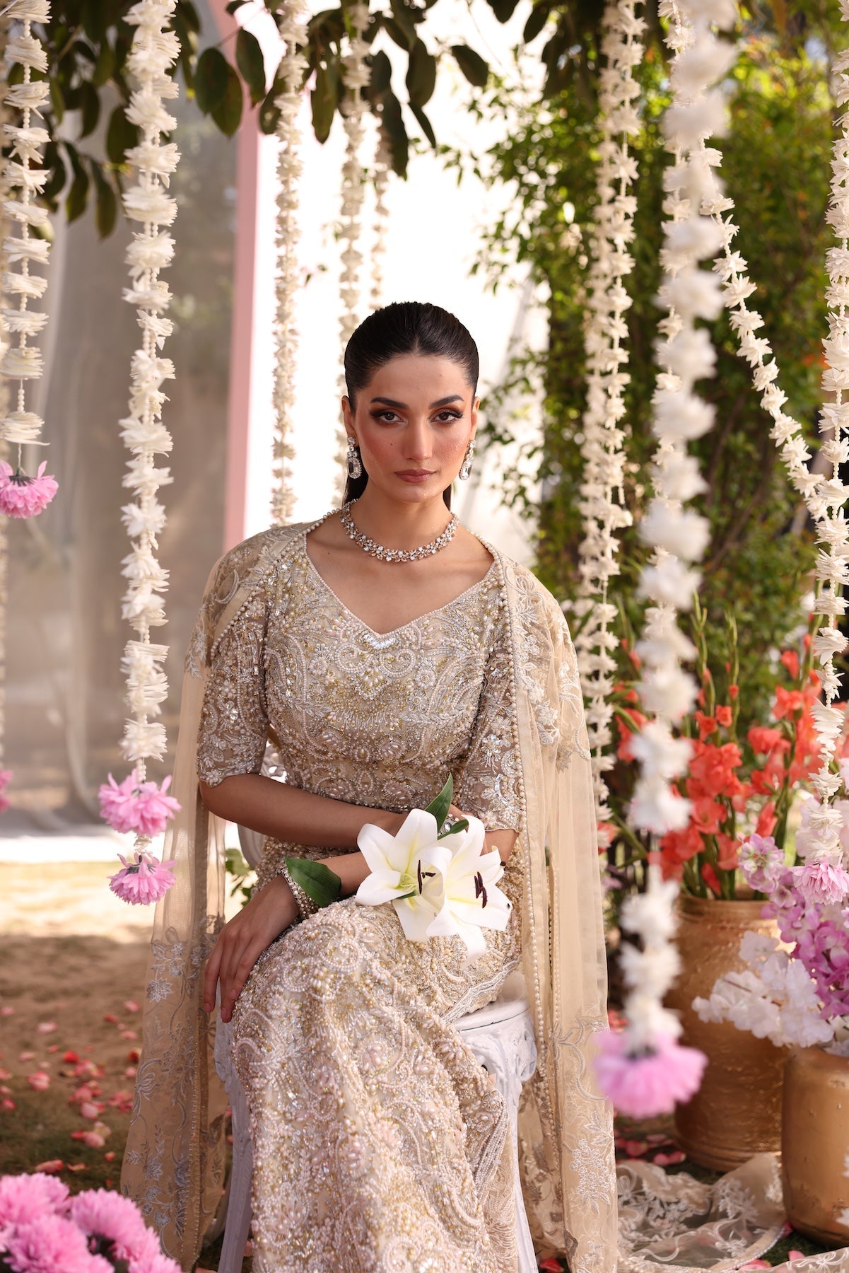 Model wearing beige embellished straight-cut shirt with trousers from Mysie By Tahira’s Tessa, featuring intricate detailing, Pakistani luxury pret clothes online in UK.