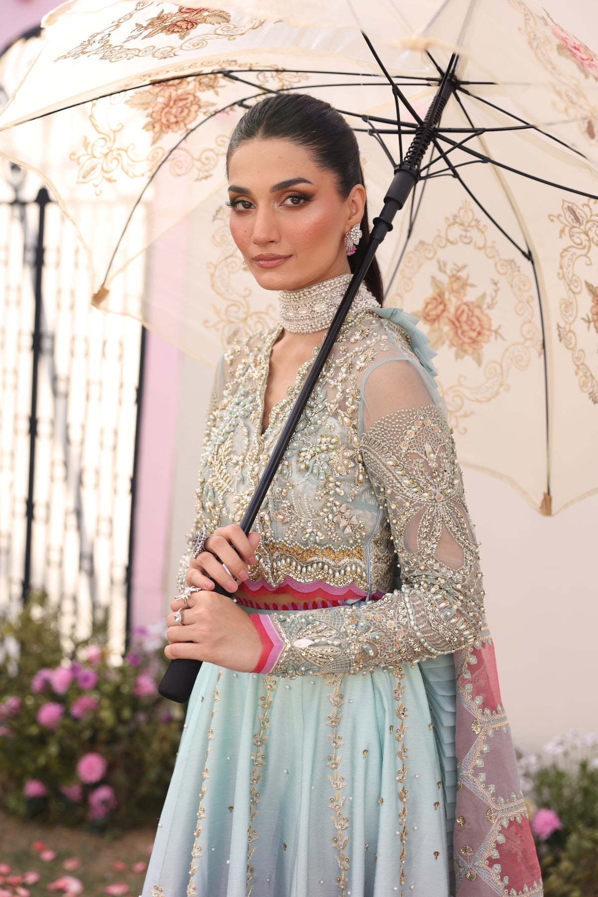 Model wearing gradient ombré pastel blue and pink Ghazal dress from Mysie By Tahira, Pakistani luxury pret and clothes online in UK.