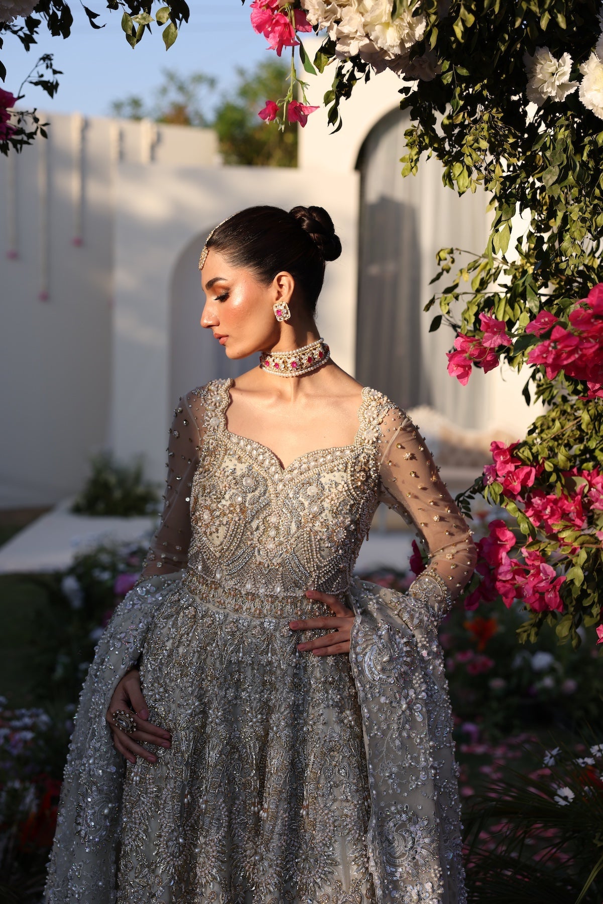 Model wearing silver embellished bridal gown from Mysie By Tahira’s Catherina design, Pakistani luxury pret and clothes online in UK.