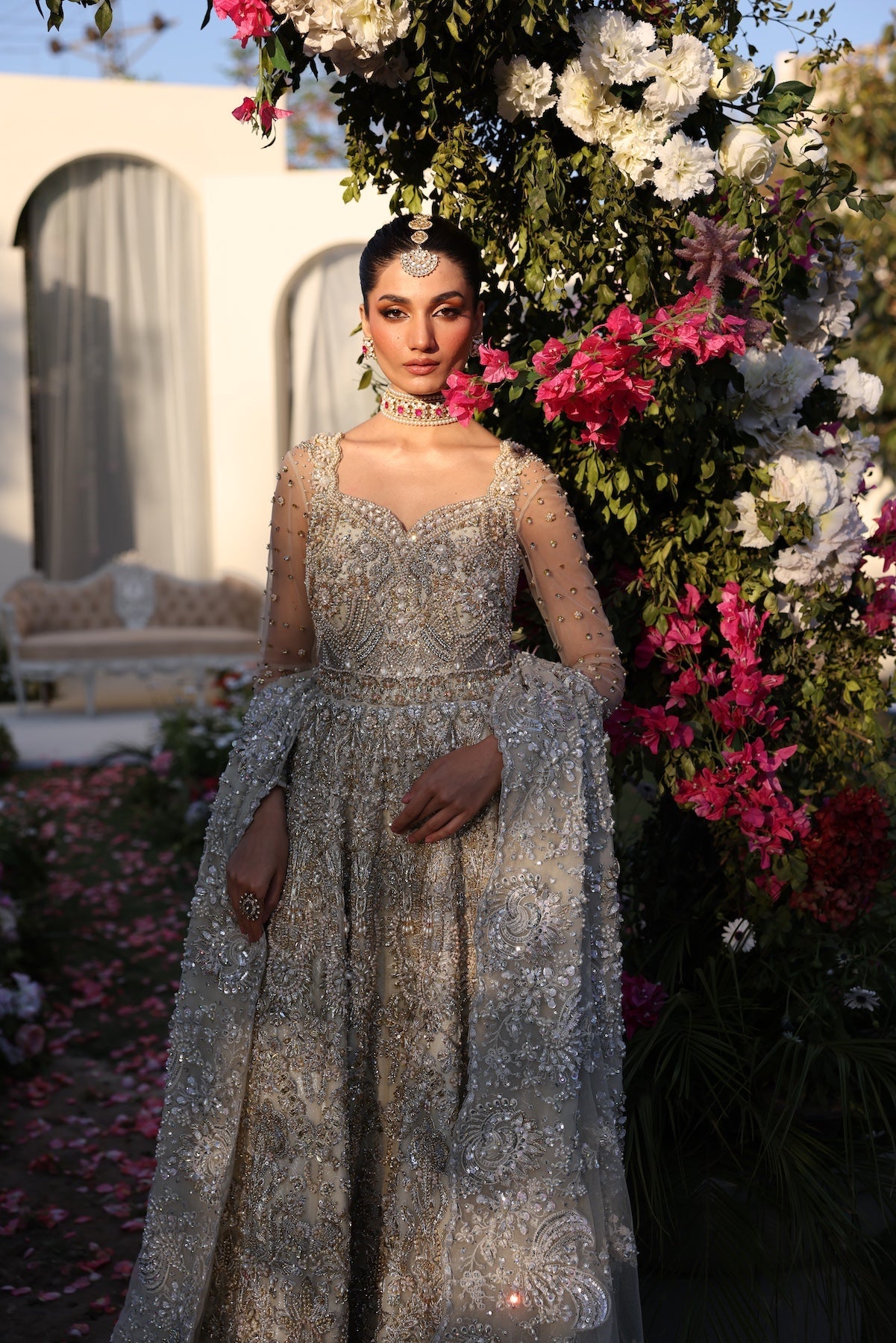 Model wearing silver embellished bridal gown from Mysie By Tahira’s Catherina design, Pakistani luxury pret and clothes online in UK.