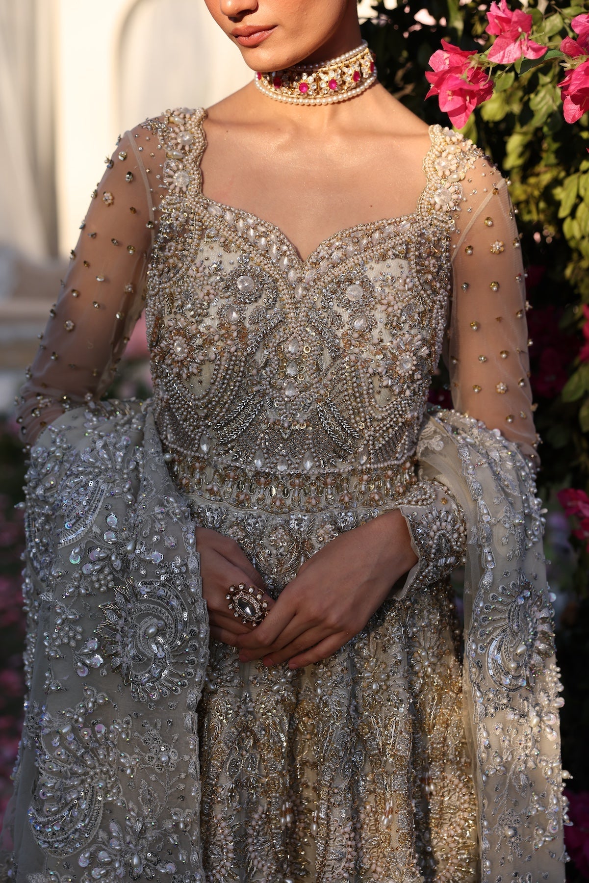 Model wearing silver embellished bridal gown from Mysie By Tahira’s Catherina design, Pakistani luxury pret and clothes online in UK.