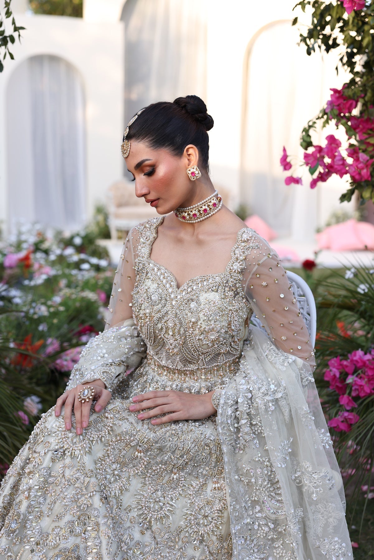 Model wearing silver embellished bridal gown from Mysie By Tahira’s Catherina design, Pakistani luxury pret and clothes online in UK.