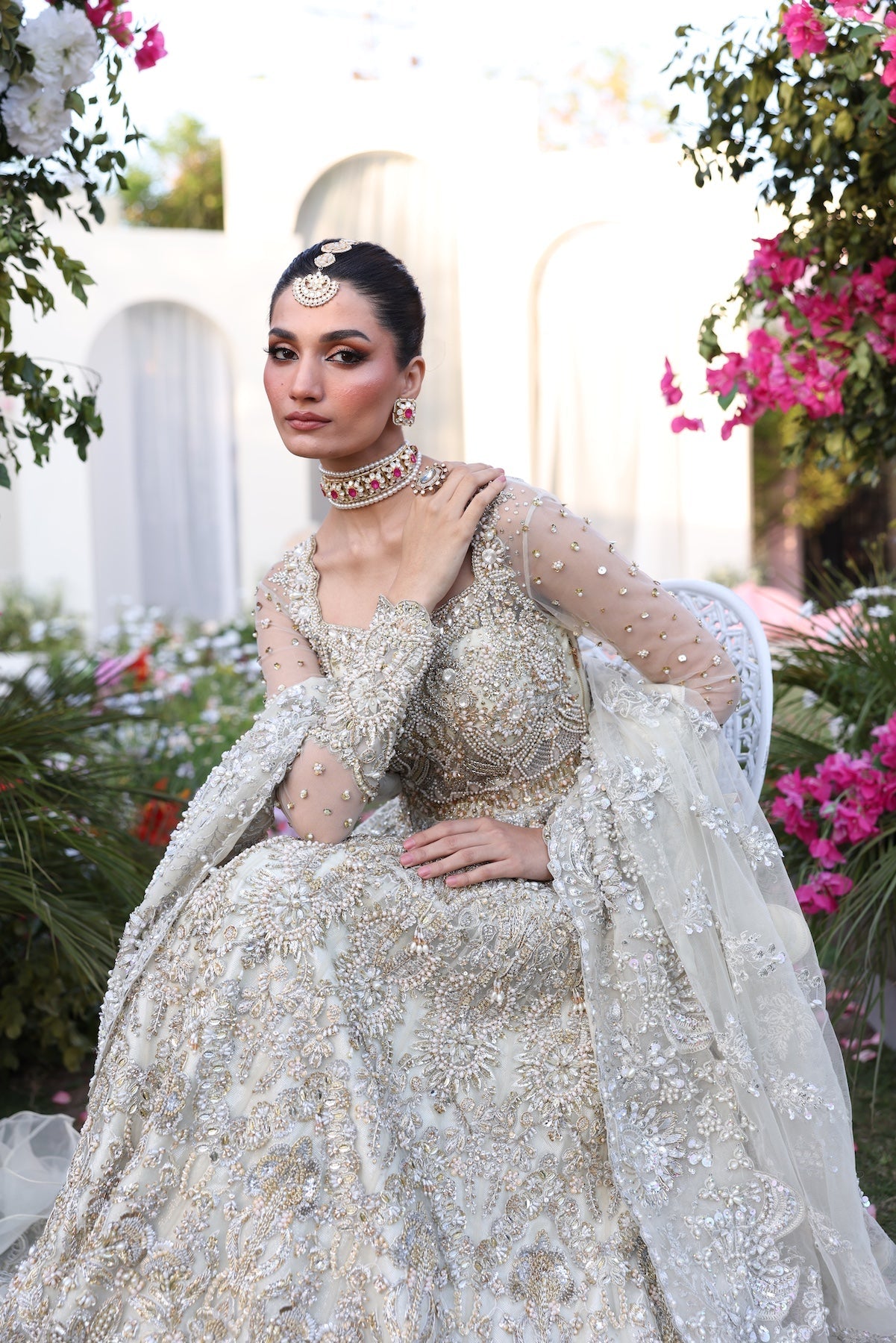 Model wearing silver embellished bridal gown from Mysie By Tahira’s Catherina design, Pakistani luxury pret and clothes online in UK.
