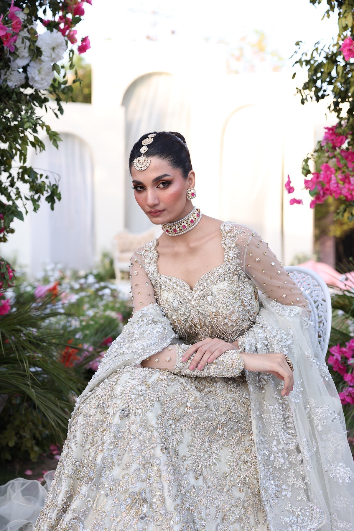 Model wearing silver embellished bridal gown from Mysie By Tahira’s Catherina design, Pakistani luxury pret and clothes online in UK.