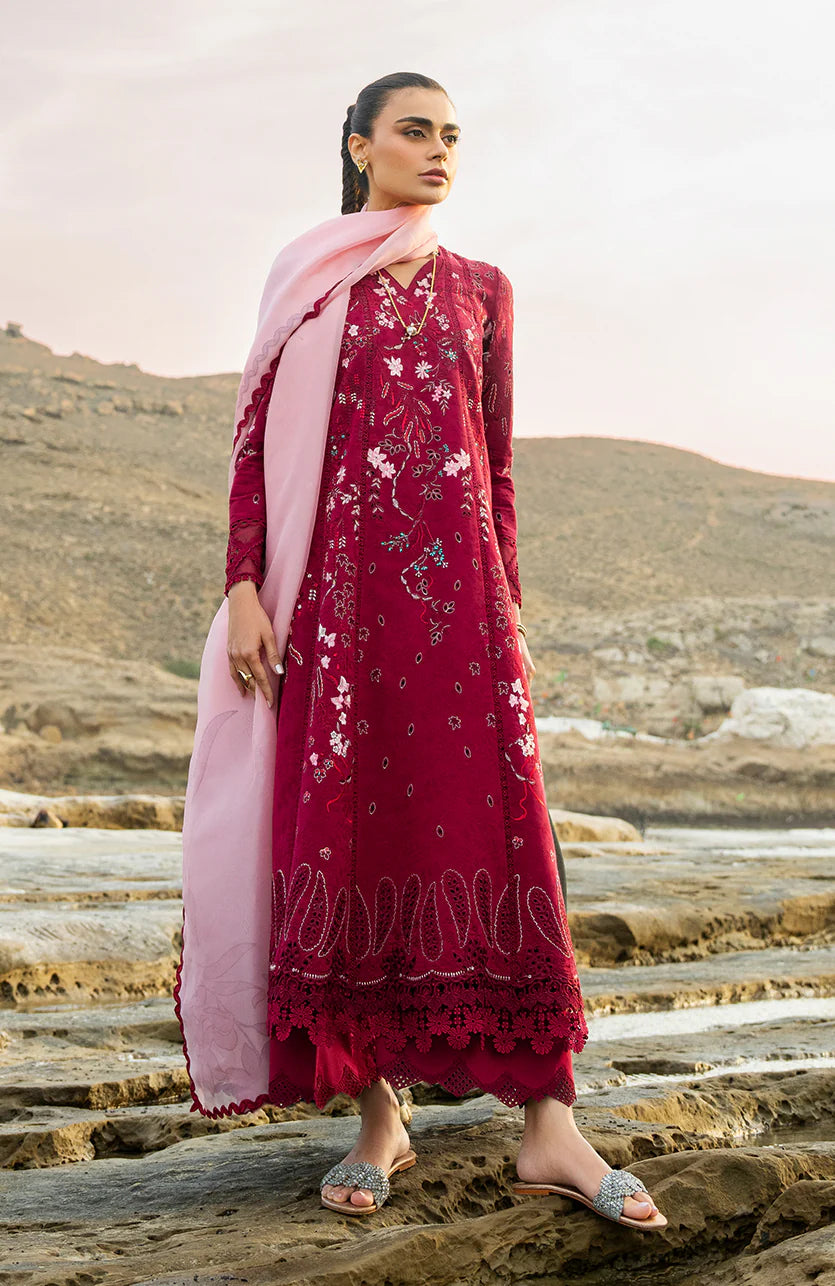 Model wearing deep red embroidered dress with pink dupatta from Soraya Noa Summer Casual Pret 2025 Carmine. Pakistani luxury pret in UK.