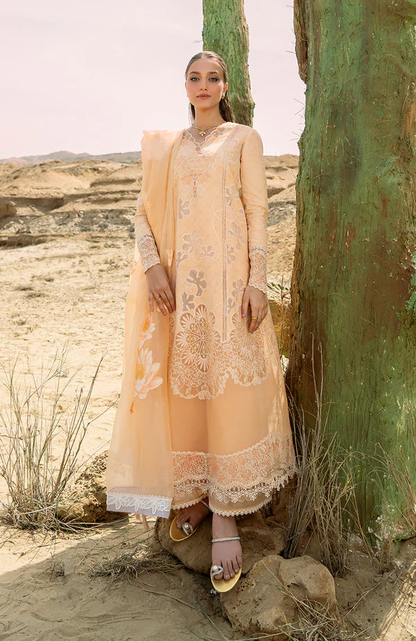 Model wearing peach embroidered dress with matching dupatta from Soraya Noa Summer Casual Pret 2025 Fresco. Pakistani luxury pret UK.