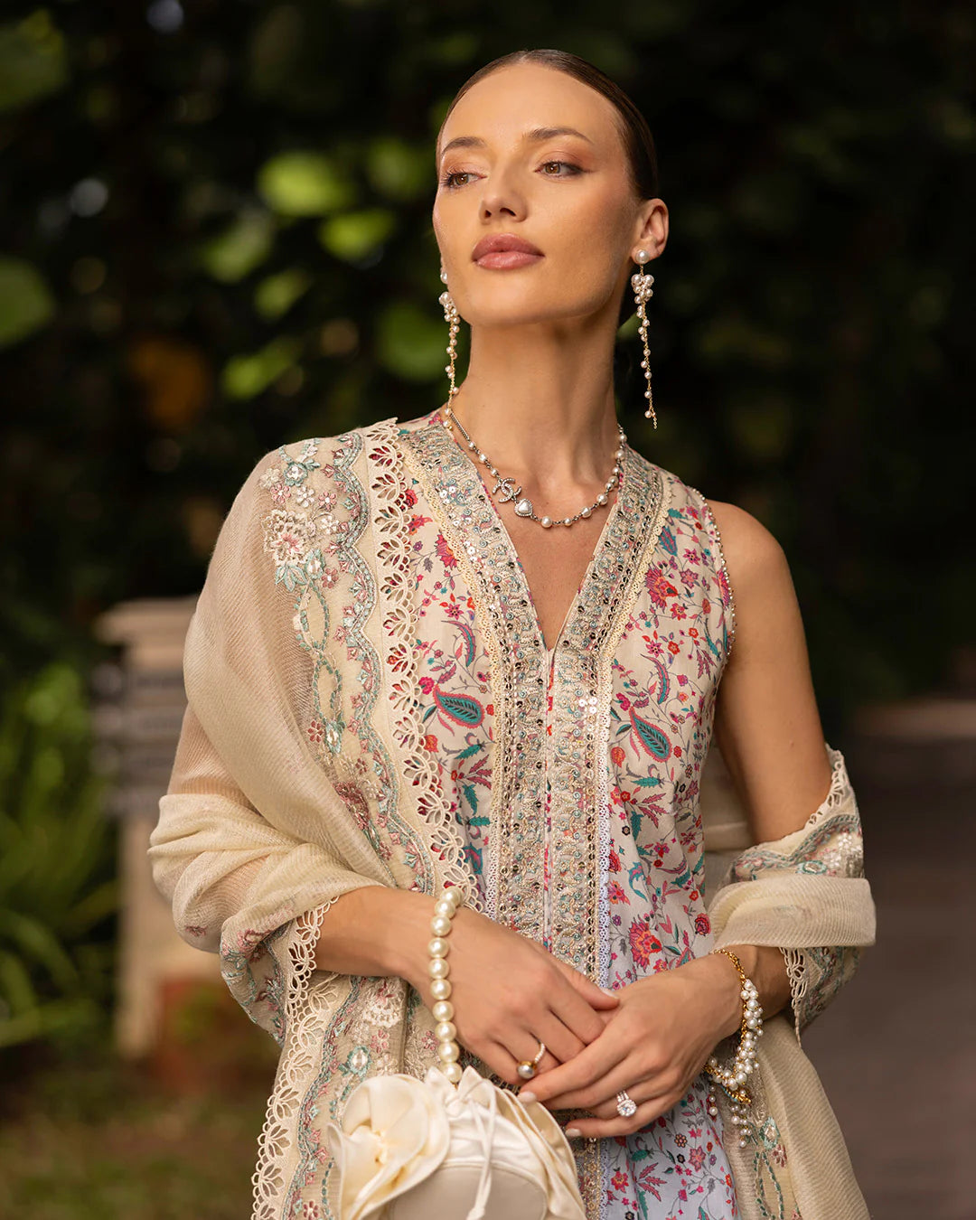Model wearing multicolored Danica dress with mint trousers from Faiza Saqlain Zinnia collection, Pakistani Luxury pret, Pakistani clothes online in UK.