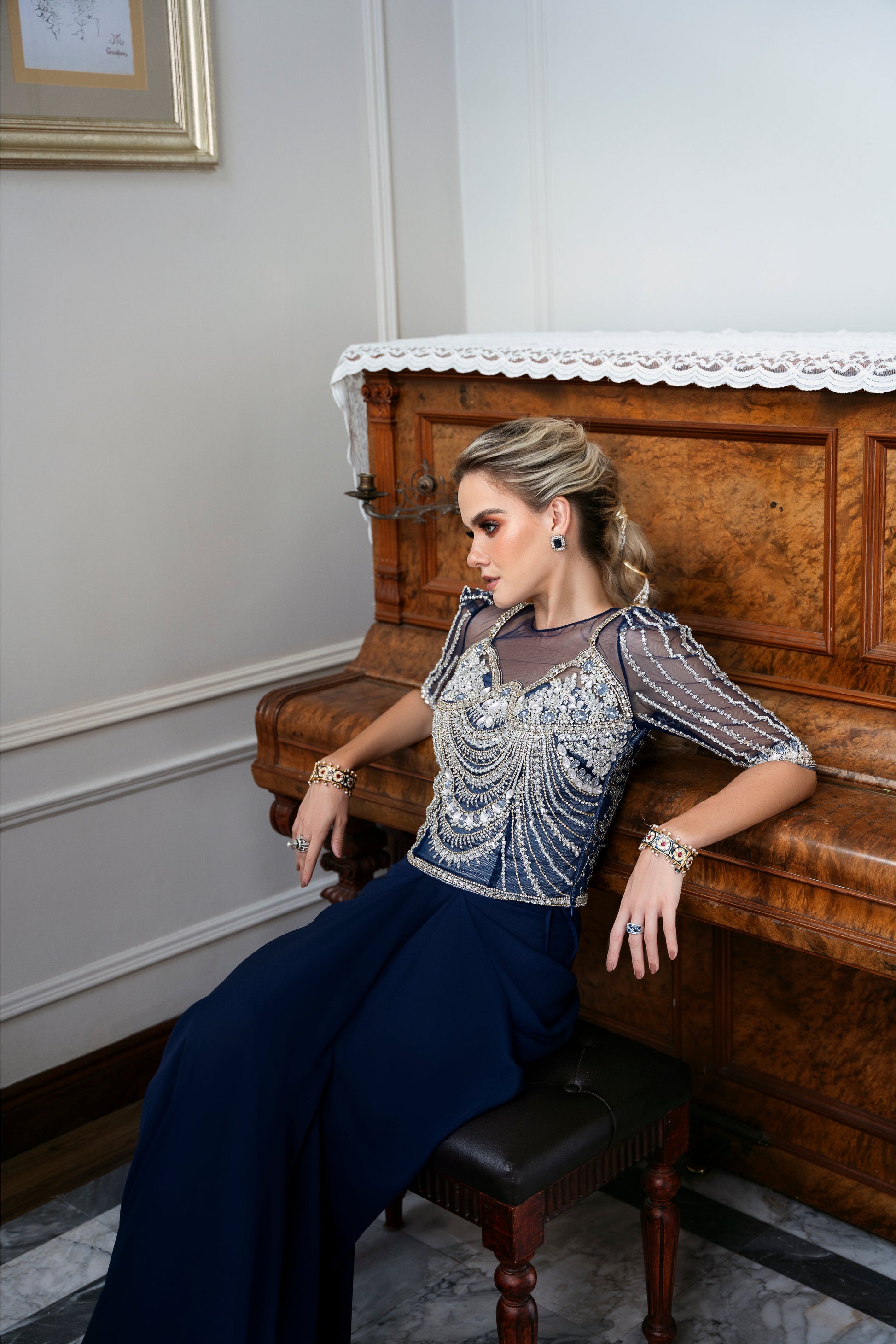 Model wearing Bluebell from Mysie by Tahira, a luxurious navy blue outfit with intricate beaded details, perfect for Pakistani luxury pret in the UK.