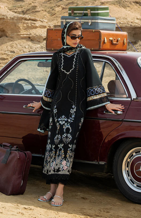 Model wearing black embroidered dress with detailed sleeves and dupatta from Soraya Noa Summer Casual Pret 2025 Mavro. Pakistani clothes online UK.