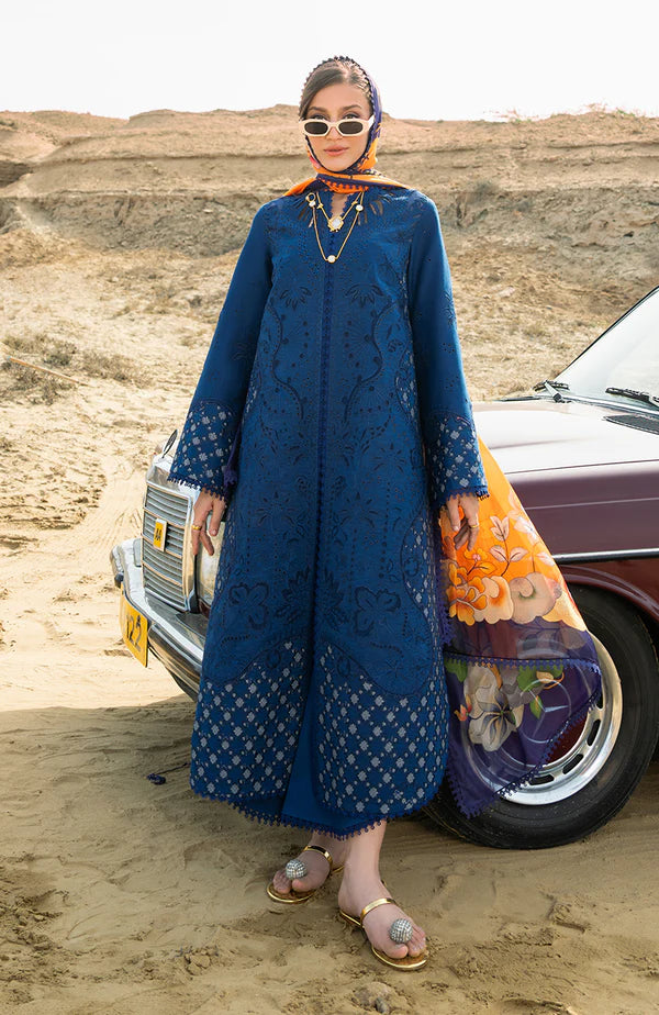 Model wearing royal blue embroidered dress with floral dupatta from Soraya Noa Summer Casual Pret 2025 Azul. Pakistani luxury pret in UK.