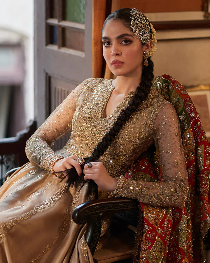 Model wearing beige and multicolor dress Sulata by Faiza Saqlain, Pakistani luxury pret, available online in UK