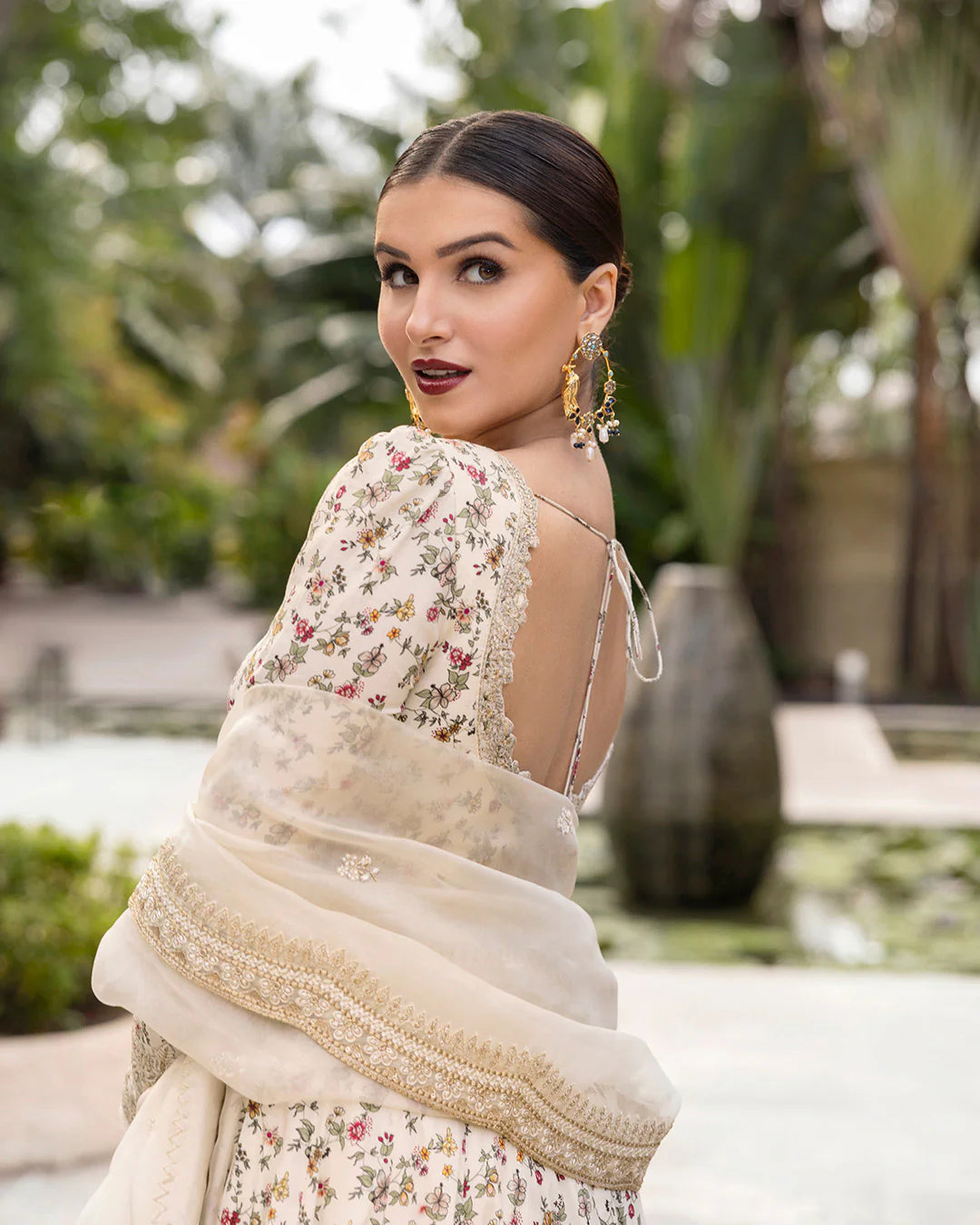 Model wearing cream floral Vinika dress from Faiza Saqlain Zinnia collection, Pakistani Luxury pret, Pakistani clothes online in UK.