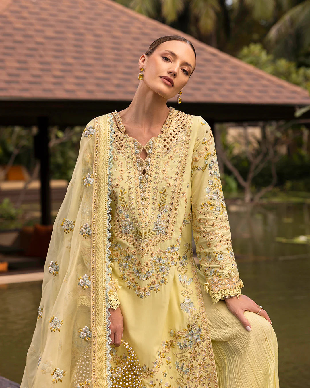 Model wearing pastel yellow Azalea dress from Faiza Saqlain Zinnia collection, Pakistani Luxury pret, Faiza Saqlain Pakistani clothes online in UK.