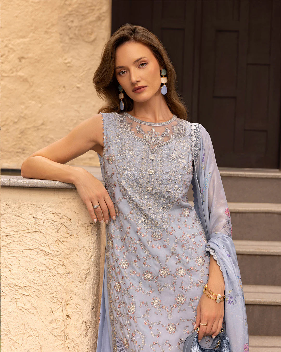 Model wearing pastel blue Liana dress from Faiza Saqlain Zinnia collection, Pakistani Luxury pret, Faiza Saqlain Pakistani clothes online in UK.