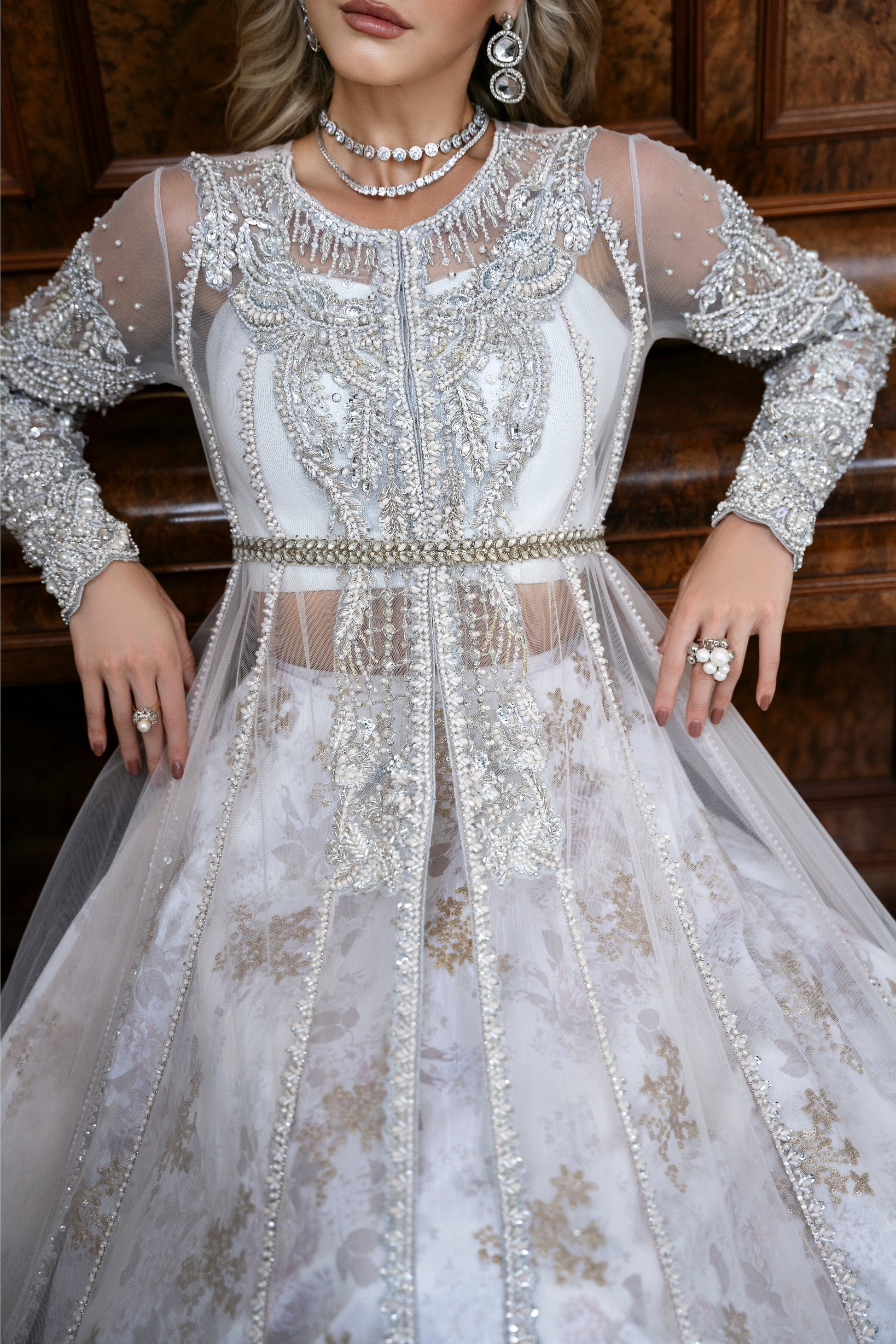 Model wearing Snowdrop from Mysie by Tahira, a stunning white and silver luxury pret outfit, perfect for Pakistani clothes in the UK.