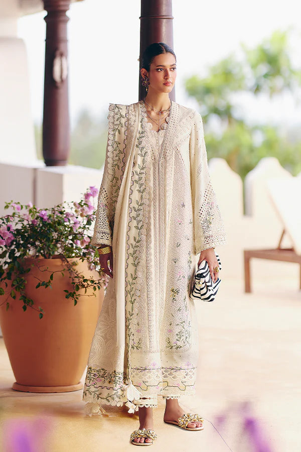 Model wearing off-white embroidered dress with delicate floral accents from Suffuse Casual Pret 2025 Afra. Pakistani luxury pret in UK.
