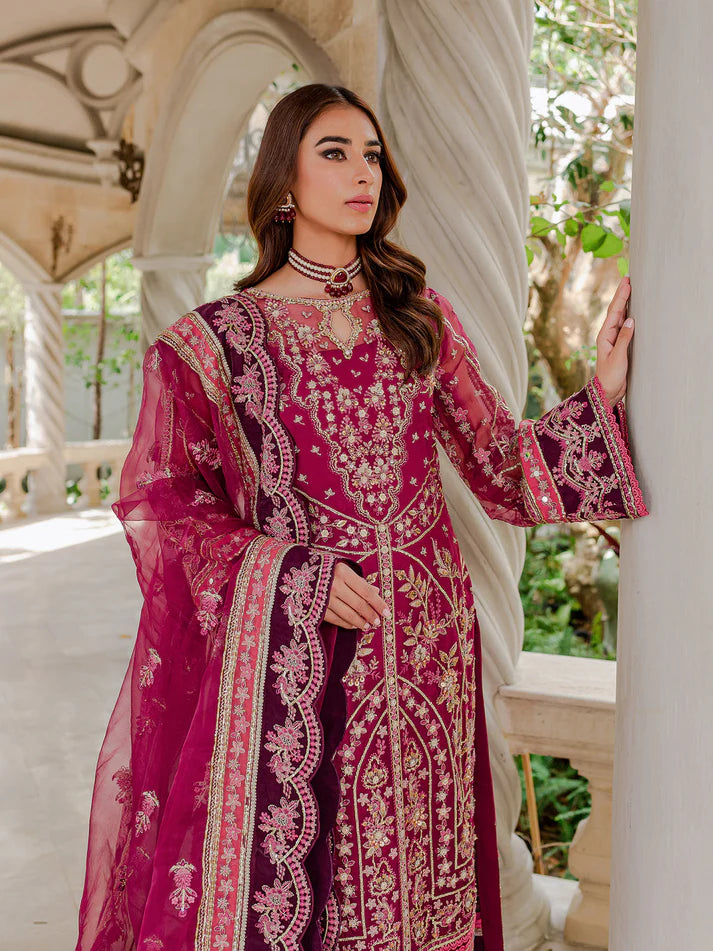 Model wearing deep magenta Orissa GL-LP-V1-03 from Gulaal, intricately embroidered Pakistani luxury pret—shop Gulaal clothes online in UK.