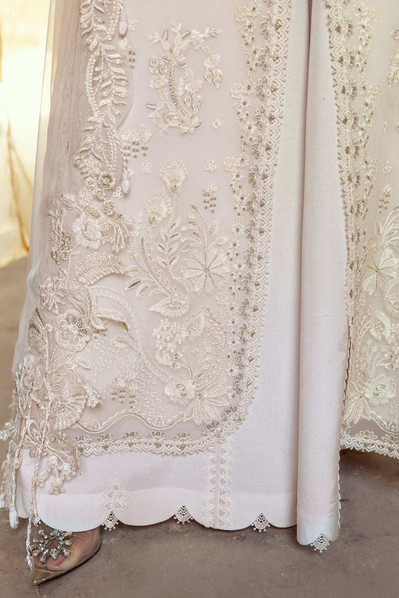 Model wearing ivory embroidered chiffon dress WC-03 ROISE from Qalamkar, perfect for Pakistani luxury pret and Pakistani clothes online in UK.