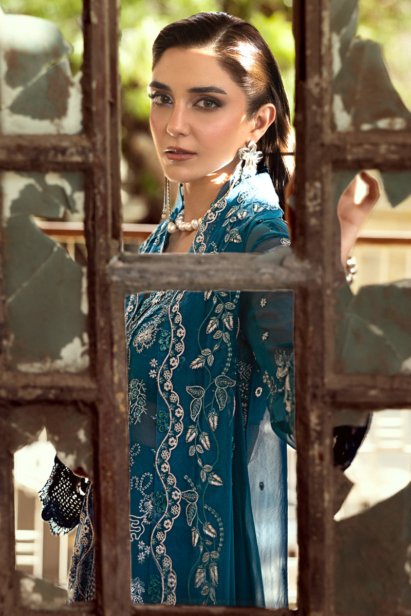 Model wearing soft lilac embroidered chiffon dress WC-04 NESSA from Qalamkar, ideal Pakistani luxury pret for Pakistani clothes online in UK.