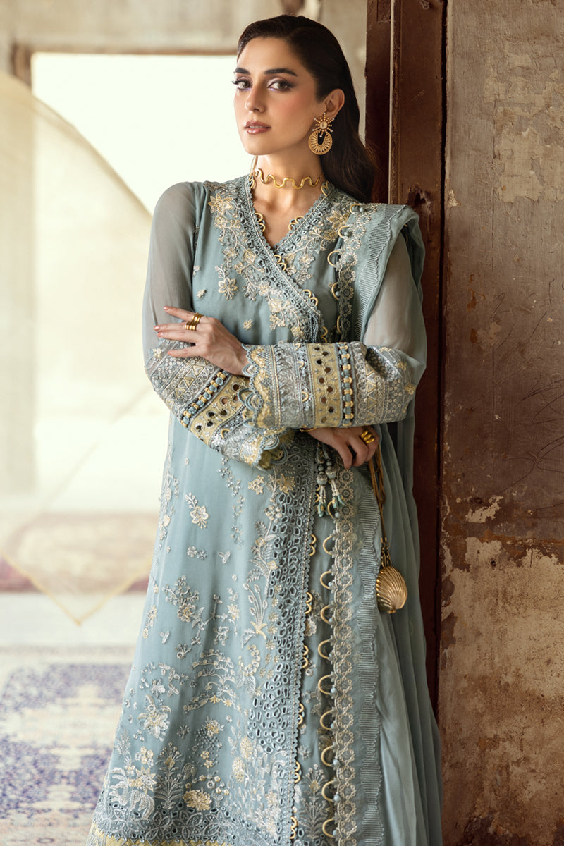 Model wearing powder blue embroidered chiffon dress WC-08 VEVIN from Qalamkar, Pakistani luxury pret available online in UK.