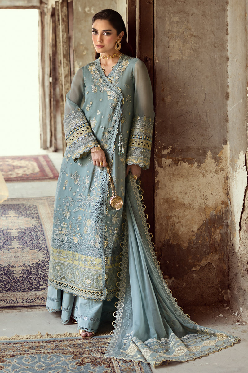 Model wearing powder blue embroidered chiffon dress WC-08 VEVIN from Qalamkar, Pakistani luxury pret available online in UK.