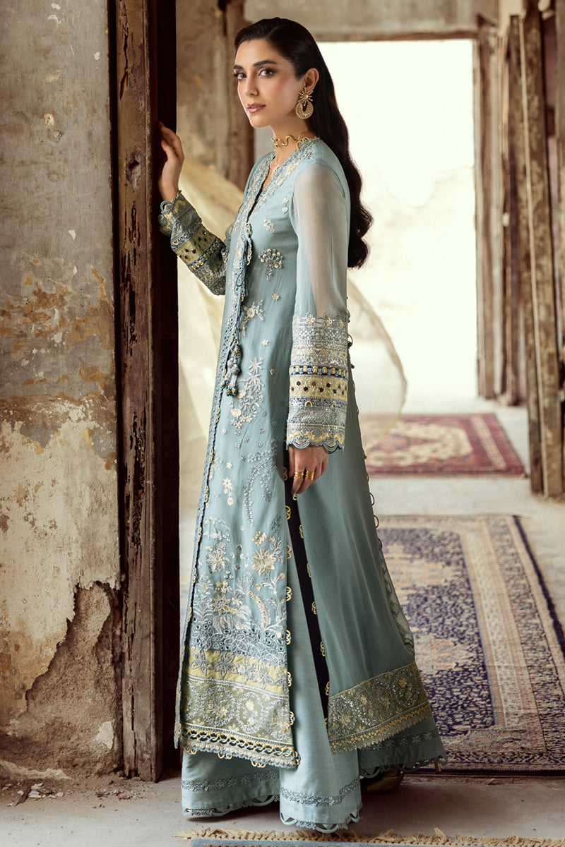 Model wearing powder blue embroidered chiffon dress WC-08 VEVIN from Qalamkar, Pakistani luxury pret available online in UK.