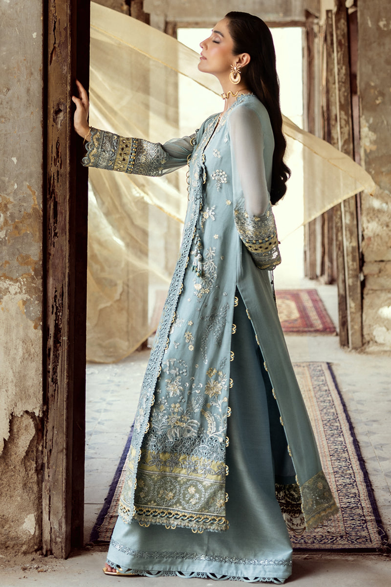 Model wearing powder blue embroidered chiffon dress WC-08 VEVIN from Qalamkar, Pakistani luxury pret available online in UK.