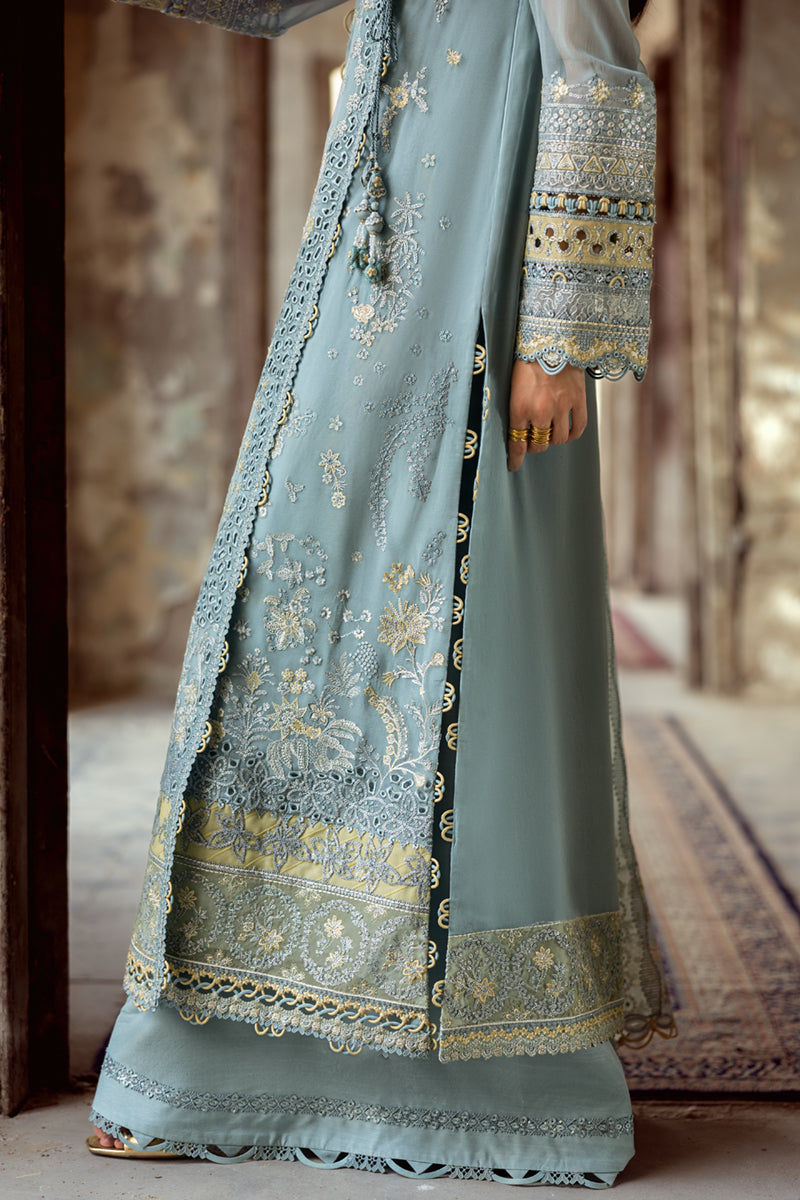 Model wearing powder blue embroidered chiffon dress WC-08 VEVIN from Qalamkar, Pakistani luxury pret available online in UK.
