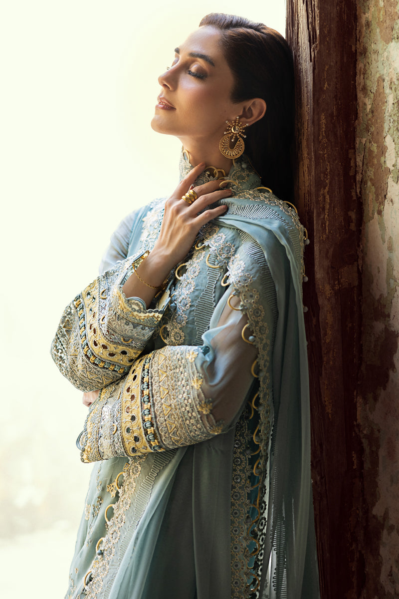 Model wearing powder blue embroidered chiffon dress WC-08 VEVIN from Qalamkar, Pakistani luxury pret available online in UK.