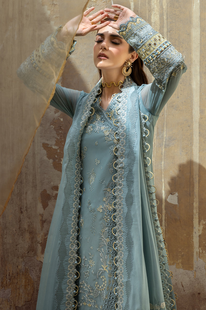 Model wearing powder blue embroidered chiffon dress WC-08 VEVIN from Qalamkar, Pakistani luxury pret available online in UK.