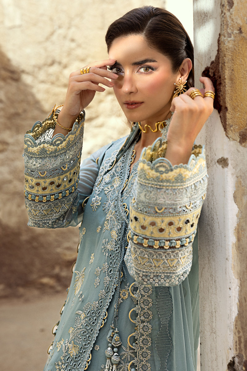 Model wearing powder blue embroidered chiffon dress WC-08 VEVIN from Qalamkar, Pakistani luxury pret available online in UK.