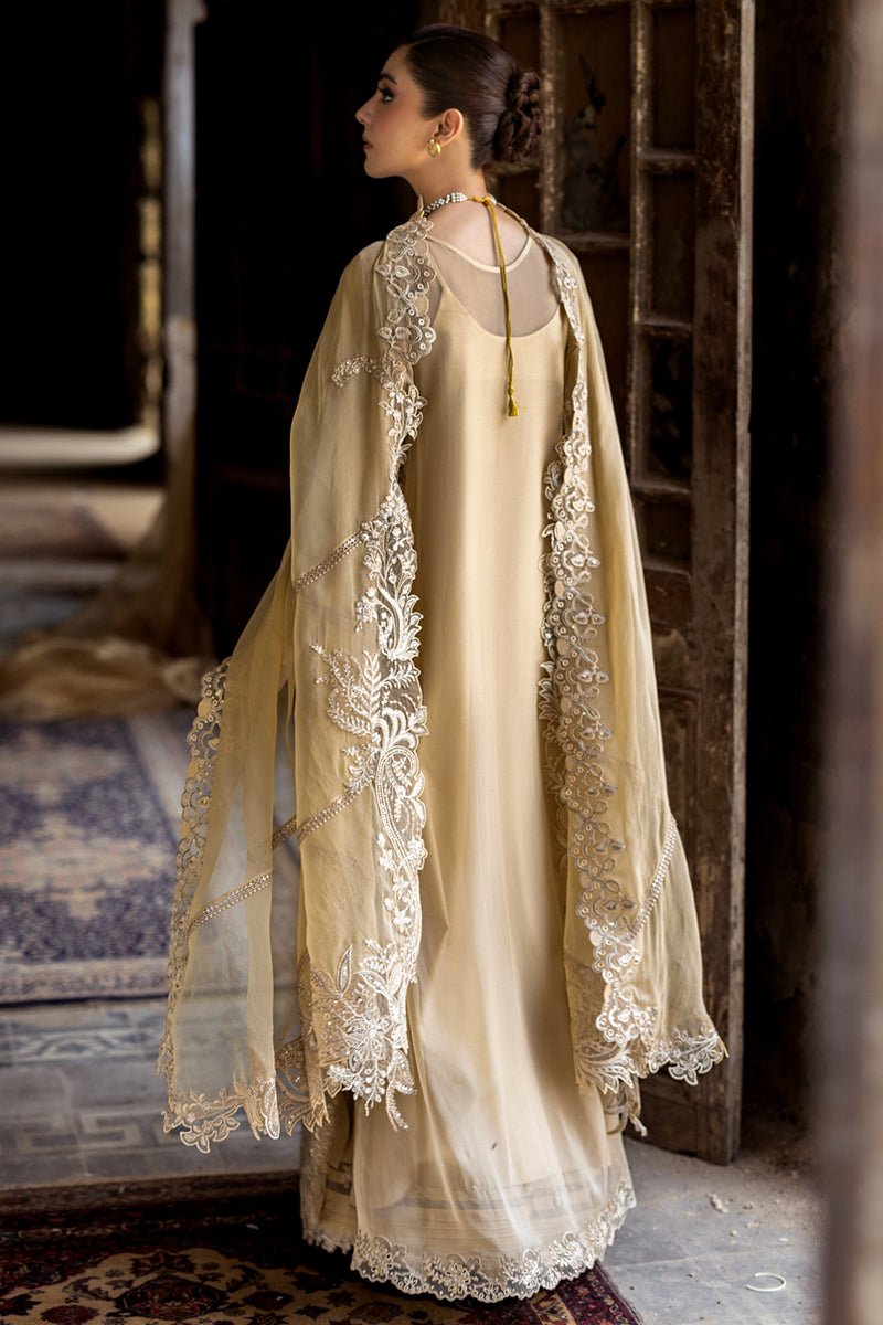 Model wearing deep red embroidered chiffon dress WC-07 HEELA from Qalamkar, Pakistani luxury pret available online in UK.