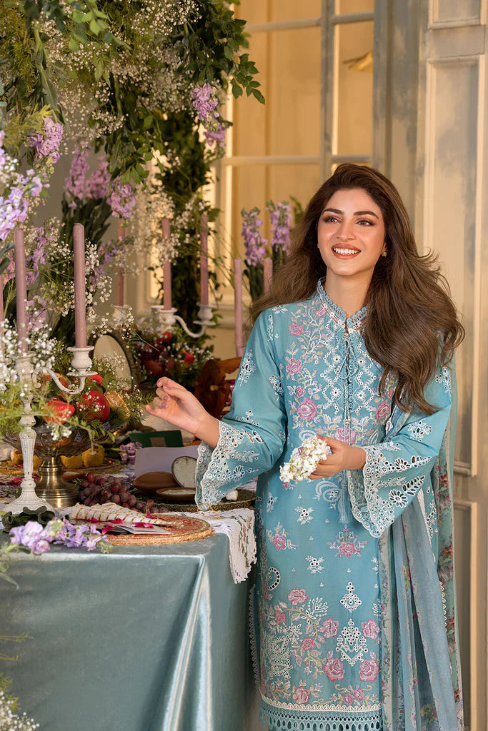 Model wearing teal blue embroidered dress from Sobia Nazir Vital 2025 Design 3A. Pakistani luxury pret and Pakistani clothes online in UK.