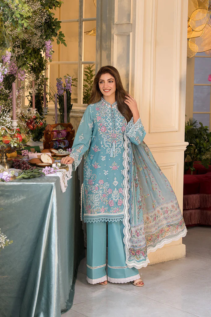 Model wearing teal blue embroidered dress from Sobia Nazir Vital 2025 Design 3A. Pakistani luxury pret and Pakistani clothes online in UK.