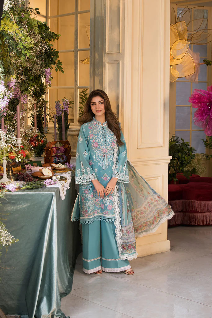 Model wearing teal blue embroidered dress from Sobia Nazir Vital 2025 Design 3A. Pakistani luxury pret and Pakistani clothes online in UK.